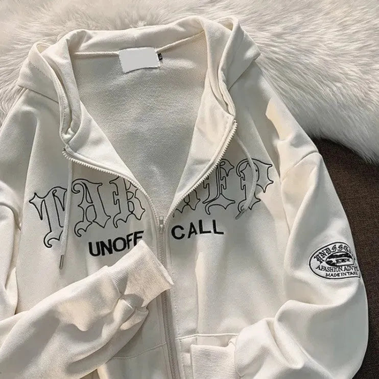 Lockere Street-Strickjacke mit Kapuze - Bellarte Enchanté Lockere Street-Strickjacke mit Kapuze