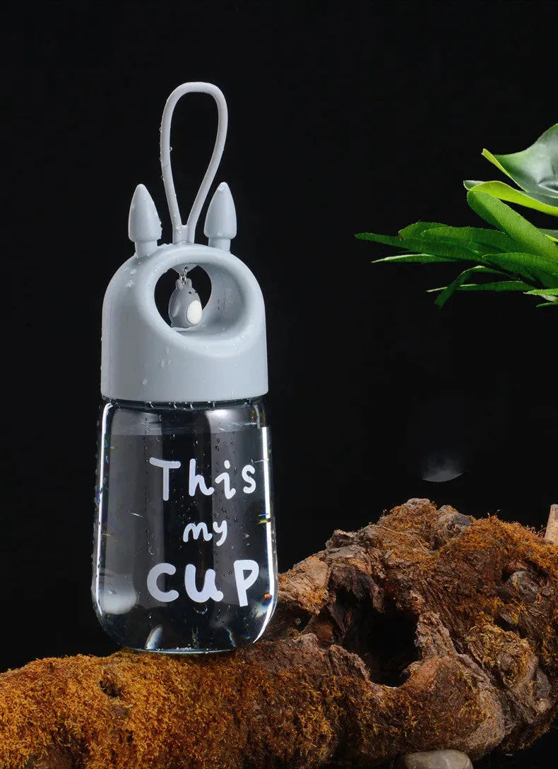 Shaking Cup Children s Water Cup Cartoon Pendant Handle Plastic Cup - Bellarte Enchanté Shaking Cup Children s Water Cup Cartoon Pendant Handle Plastic Cup